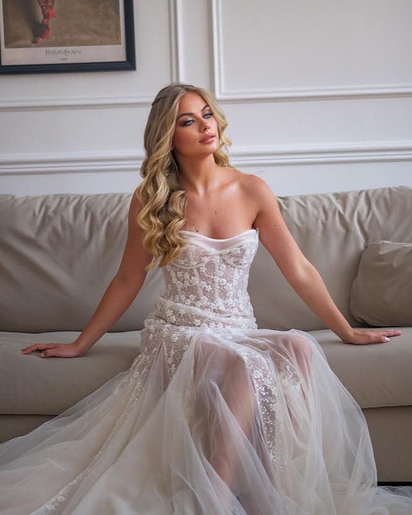 Bride in elegant Celeste sheath gown during a private fitting at our Tel Aviv bridal atelier